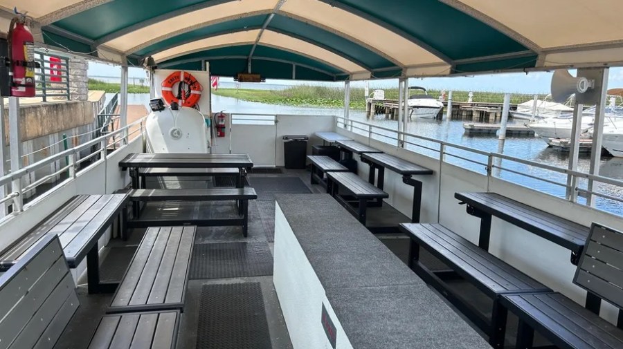 a group of people sitting at a train station